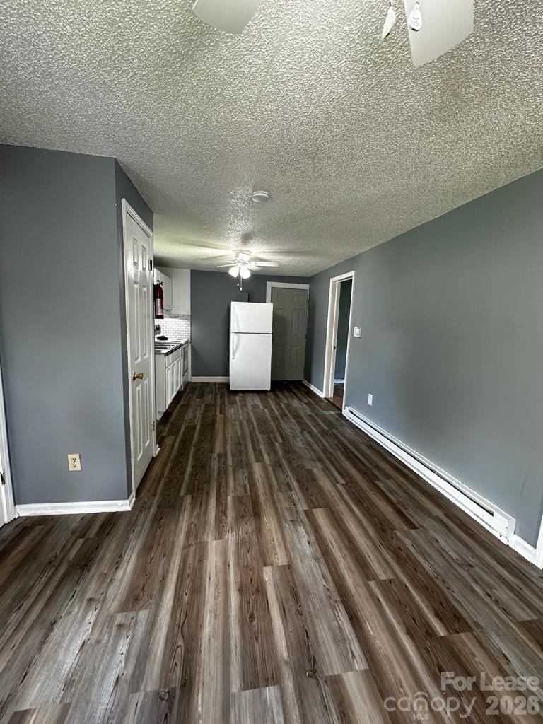 435 Davis Street Albemarle, NC 28001 - Photo 17 of 30 a view of a room with wooden floor