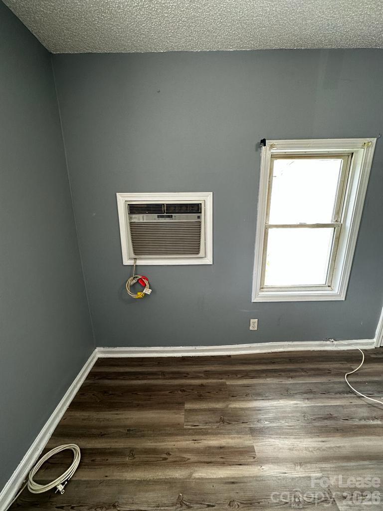 435 Davis Street Albemarle, NC 28001 - Photo 21 of 30 a view of a room with wooden floor and window