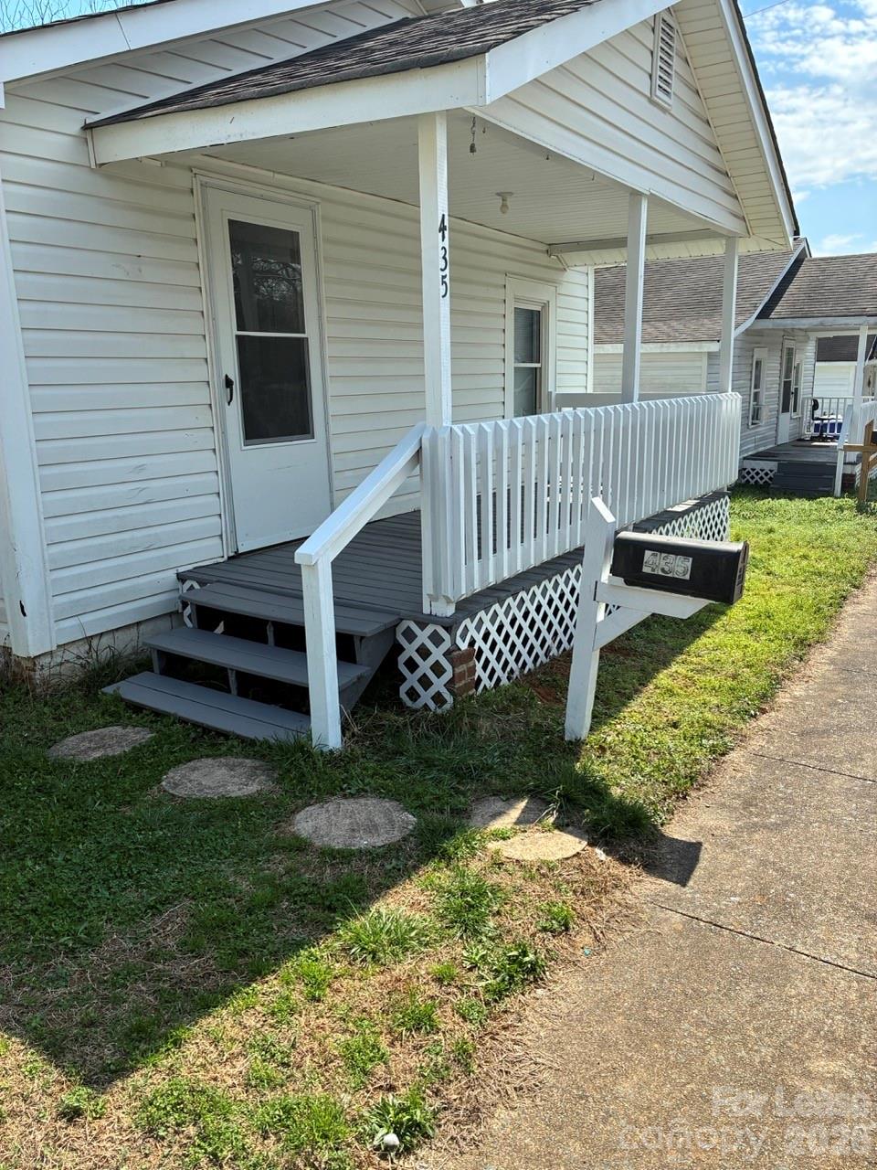 435 Davis Street Albemarle, NC 28001 - Photo 28 of 30 a view of a house with a yard and sitting area
