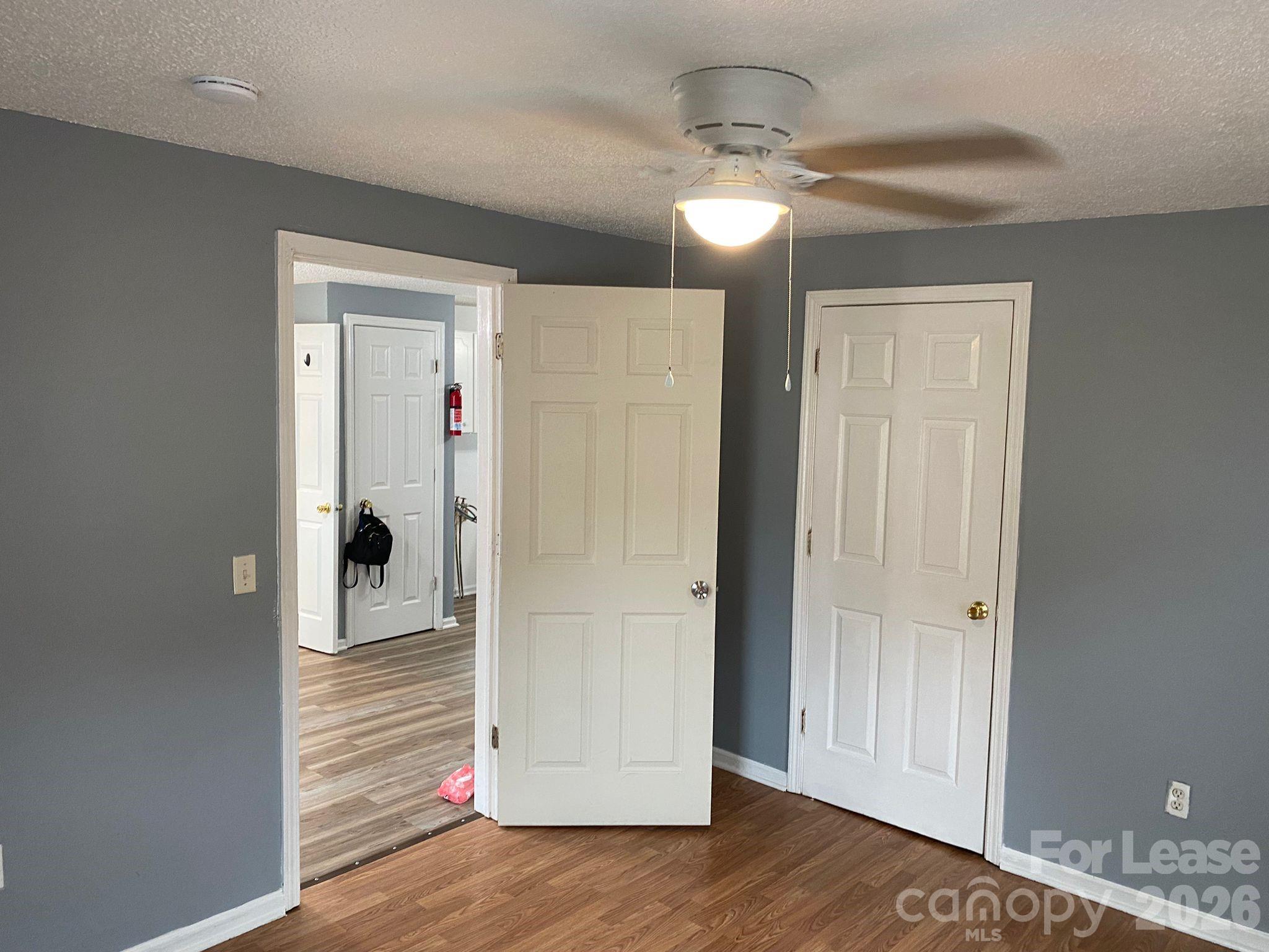 435 Davis Street Albemarle, NC 28001 - Photo 7 of 30 wooden floor in an empty room
