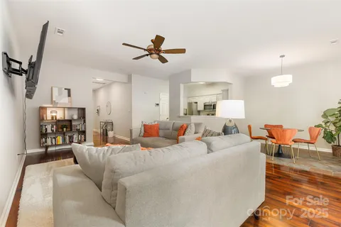 a large room with a lot of bed and couch