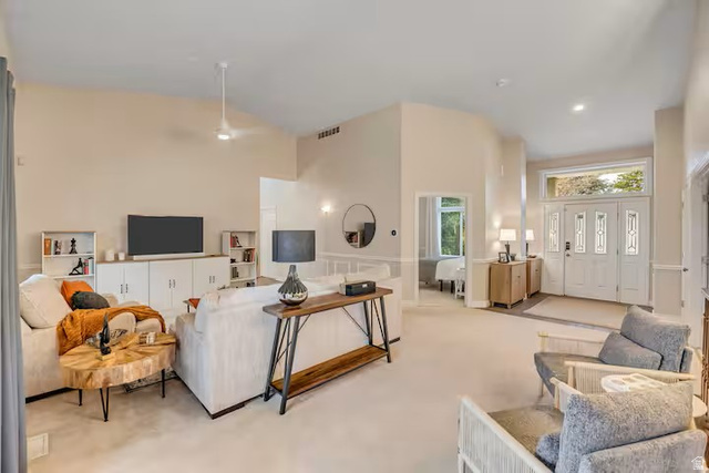 11789 Nicklaus Road Sandy, UT 84092 - Photo 4 of 58 Living room featuring light carpet and lofted ceiling