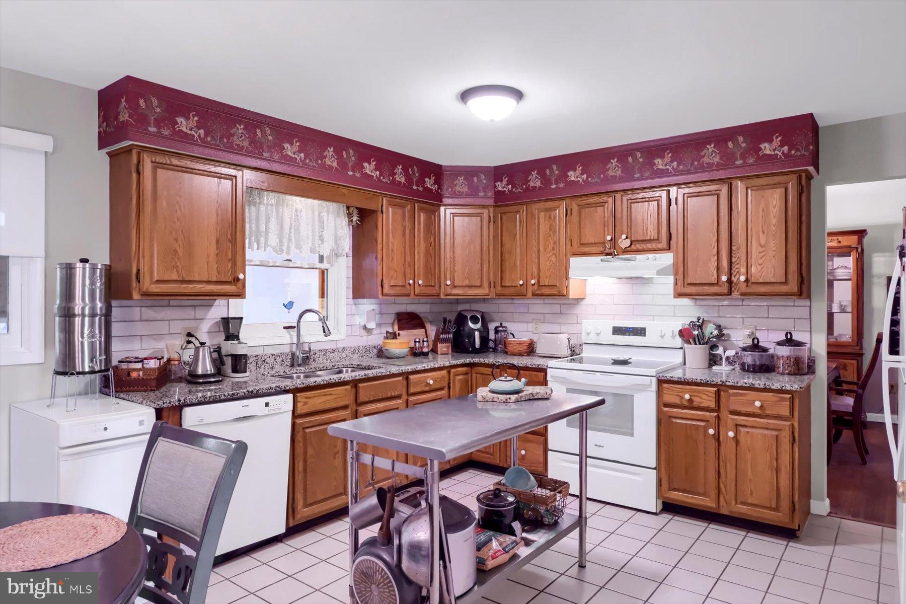 1105 Red Hill Road Port Trevorton, PA 17864 - Photo 16 of 71 Warm and inviting kitchen with classic charm.