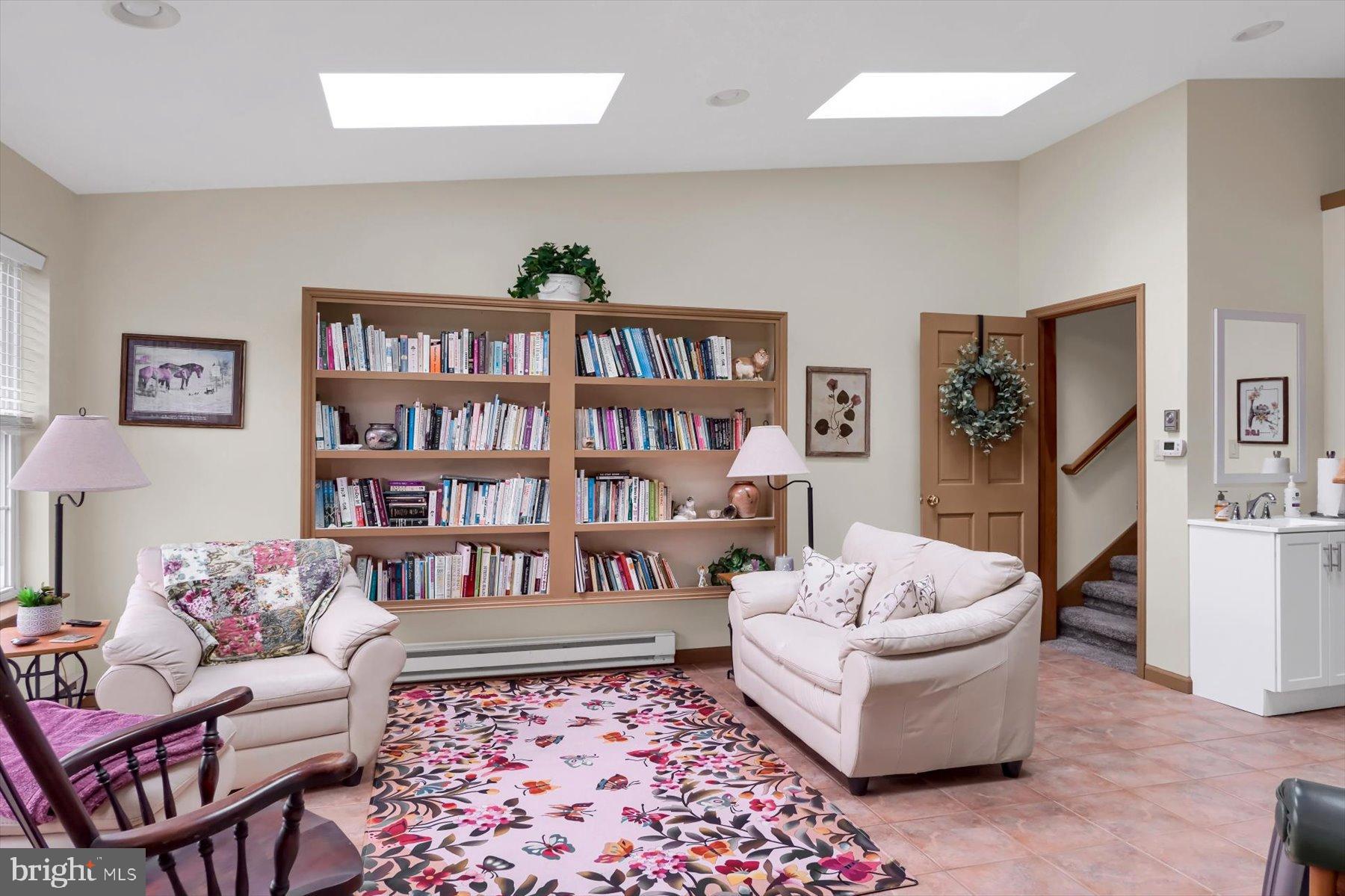 1105 Red Hill Road Port Trevorton, PA 17864 - Photo 26 of 71 a living room with furniture and a book shelf