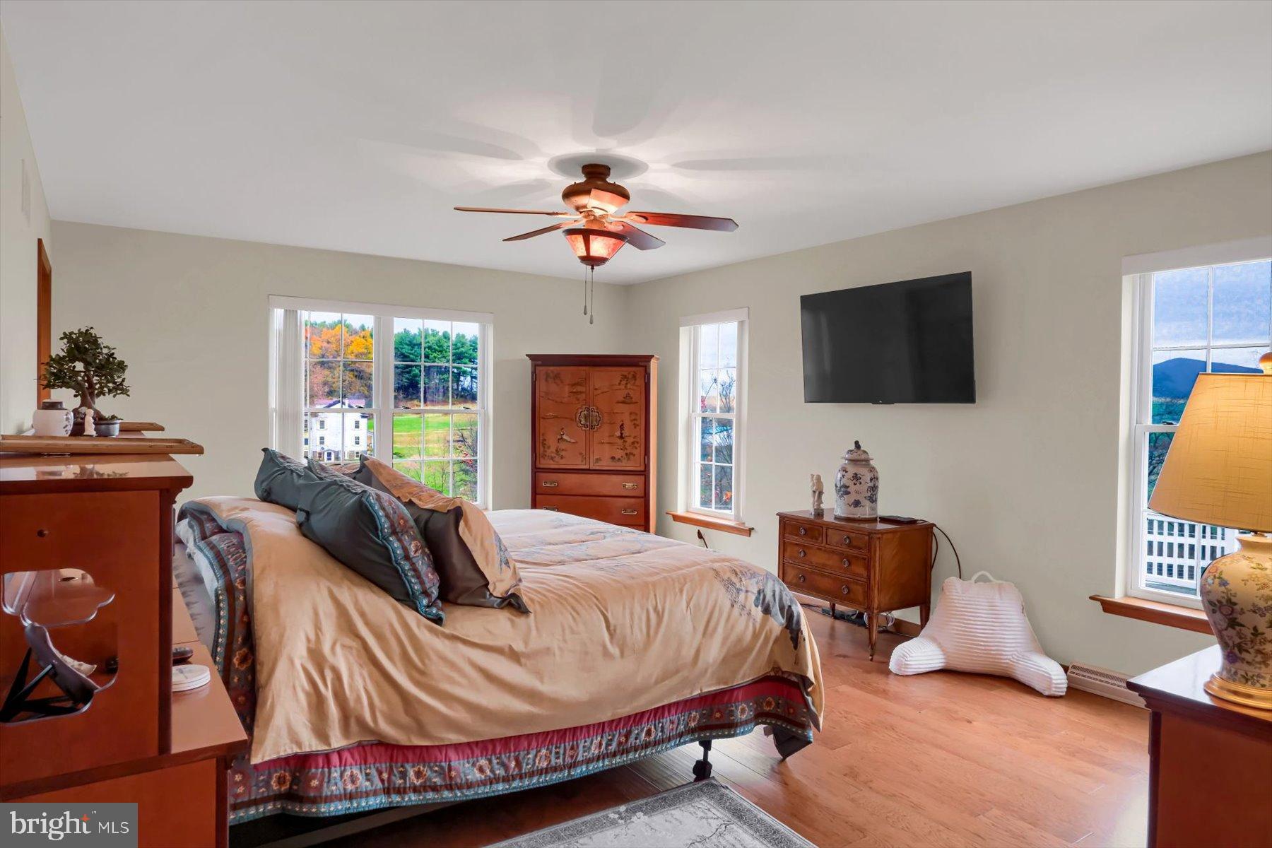 1105 Red Hill Road Port Trevorton, PA 17864 - Photo 49 of 71 a bedroom with a bed and flat screen tv