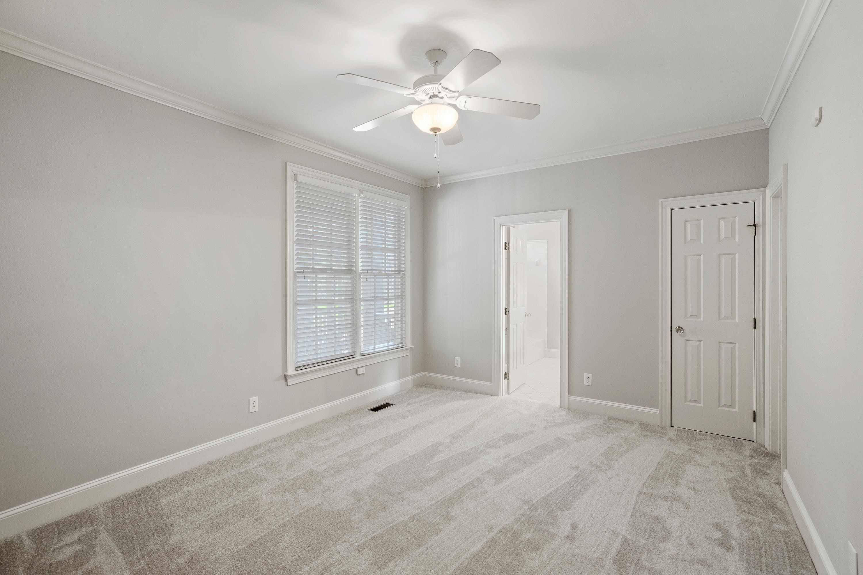 4732 Sharpstone Lane Raleigh, NC 27615 - Photo 27 of 76 Main Level Bedroom overlooks the Screened Porch