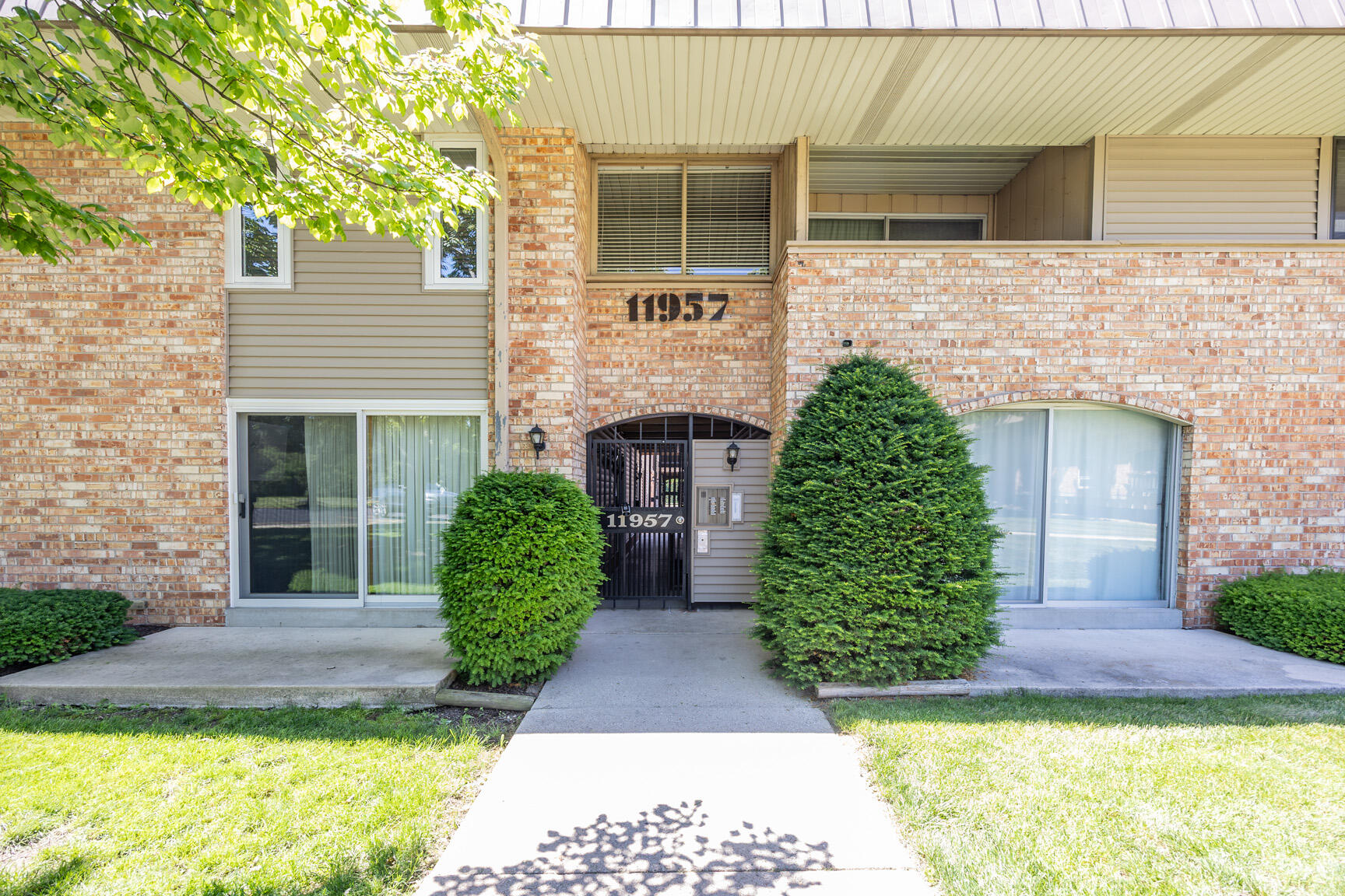 11957 West Appleton Avenue, Unit 9 Milwaukee, WI 53224 - Photo 2 of 52 Gated Entrance