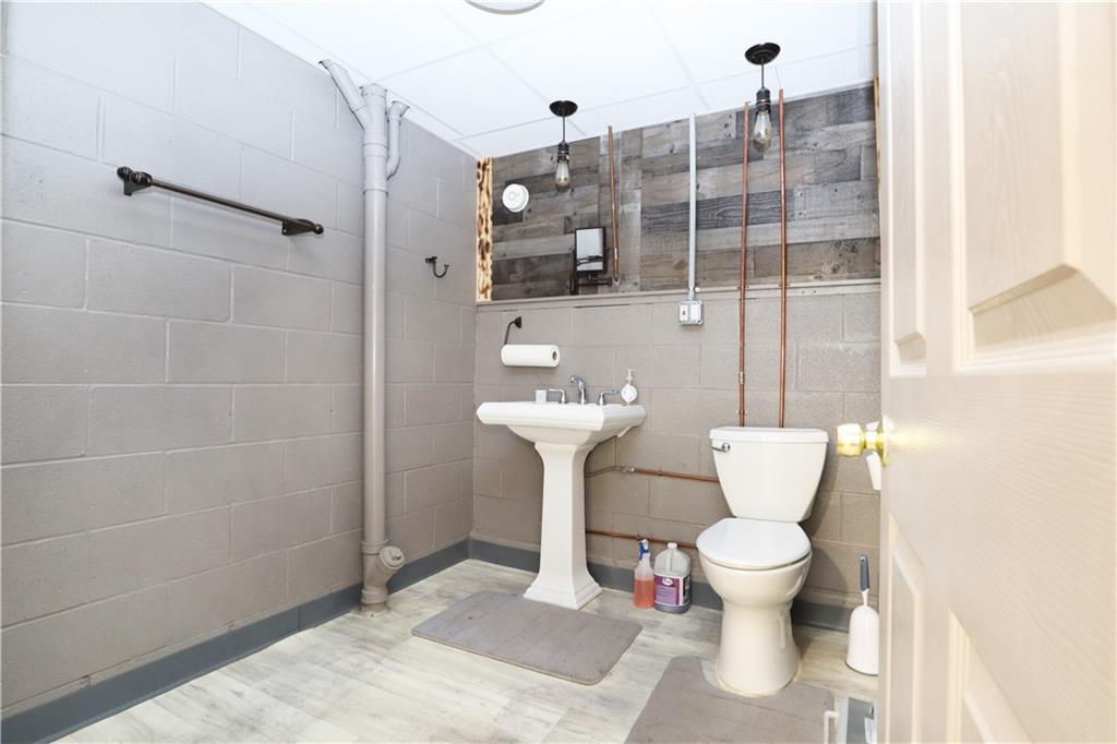 46 Rural Avenue Washington, PA 15301 - Photo 12 of 22 a bathroom with a toilet sink and shower
