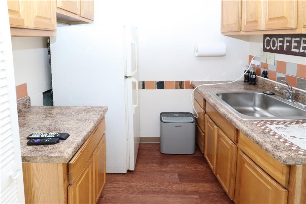46 Rural Avenue Washington, PA 15301 - Photo 16 of 22 a kitchen with a stove and a sink