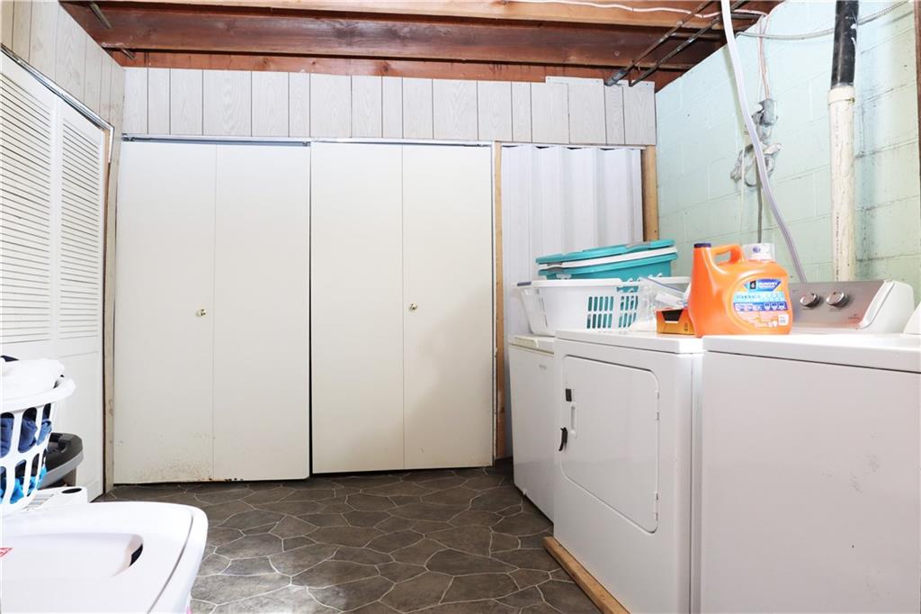 46 Rural Avenue Washington, PA 15301 - Photo 17 of 22 a bathroom with a sink a toilet and shower curtain