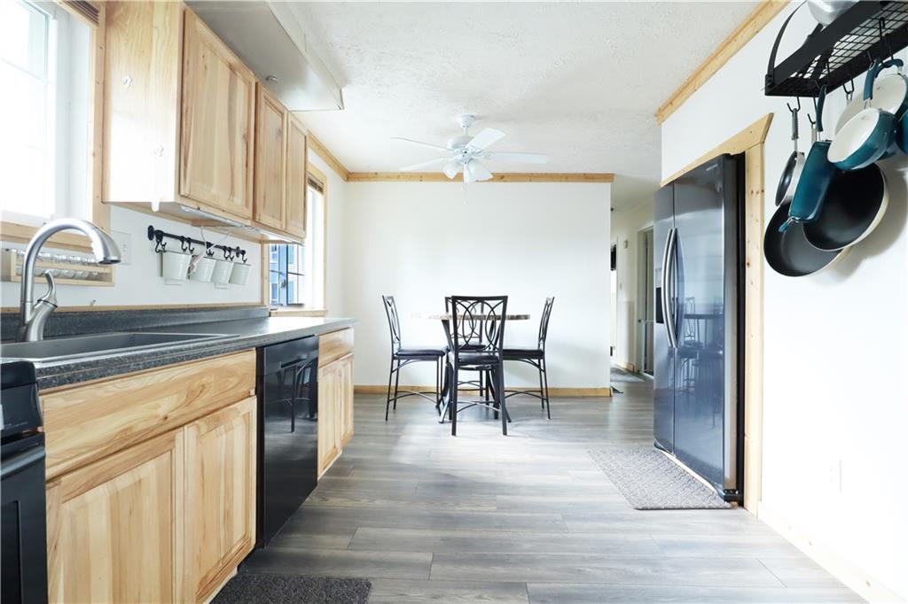 46 Rural Avenue Washington, PA 15301 - Photo 4 of 22 a kitchen with stainless steel appliances granite countertop a refrigerator and a sink