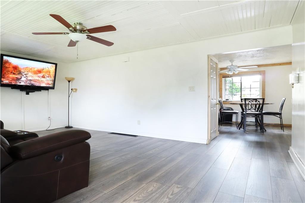 46 Rural Avenue Washington, PA 15301 - Photo 7 of 22 a living room with furniture and a flat screen tv
