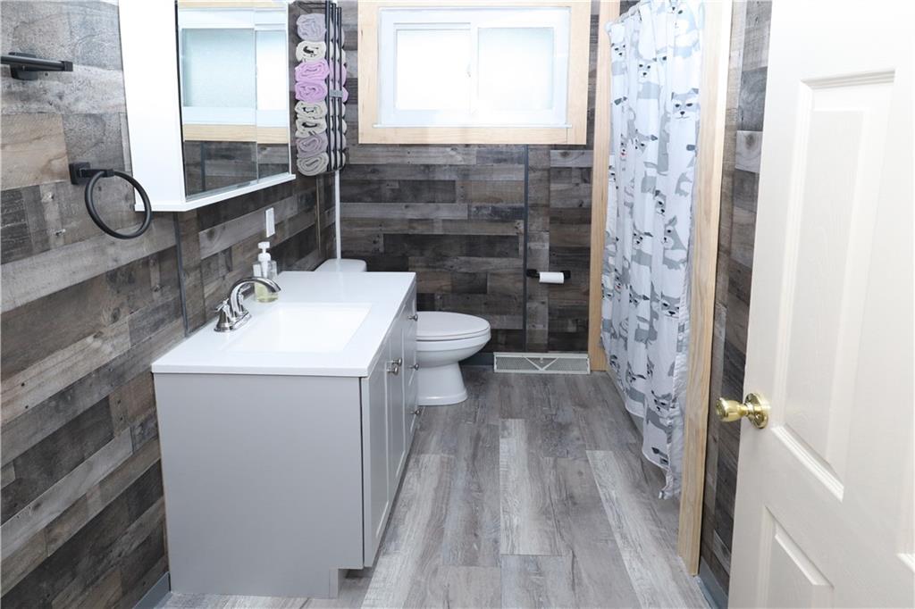 46 Rural Avenue Washington, PA 15301 - Photo 8 of 22 a bathroom with a sink a toilet and shower