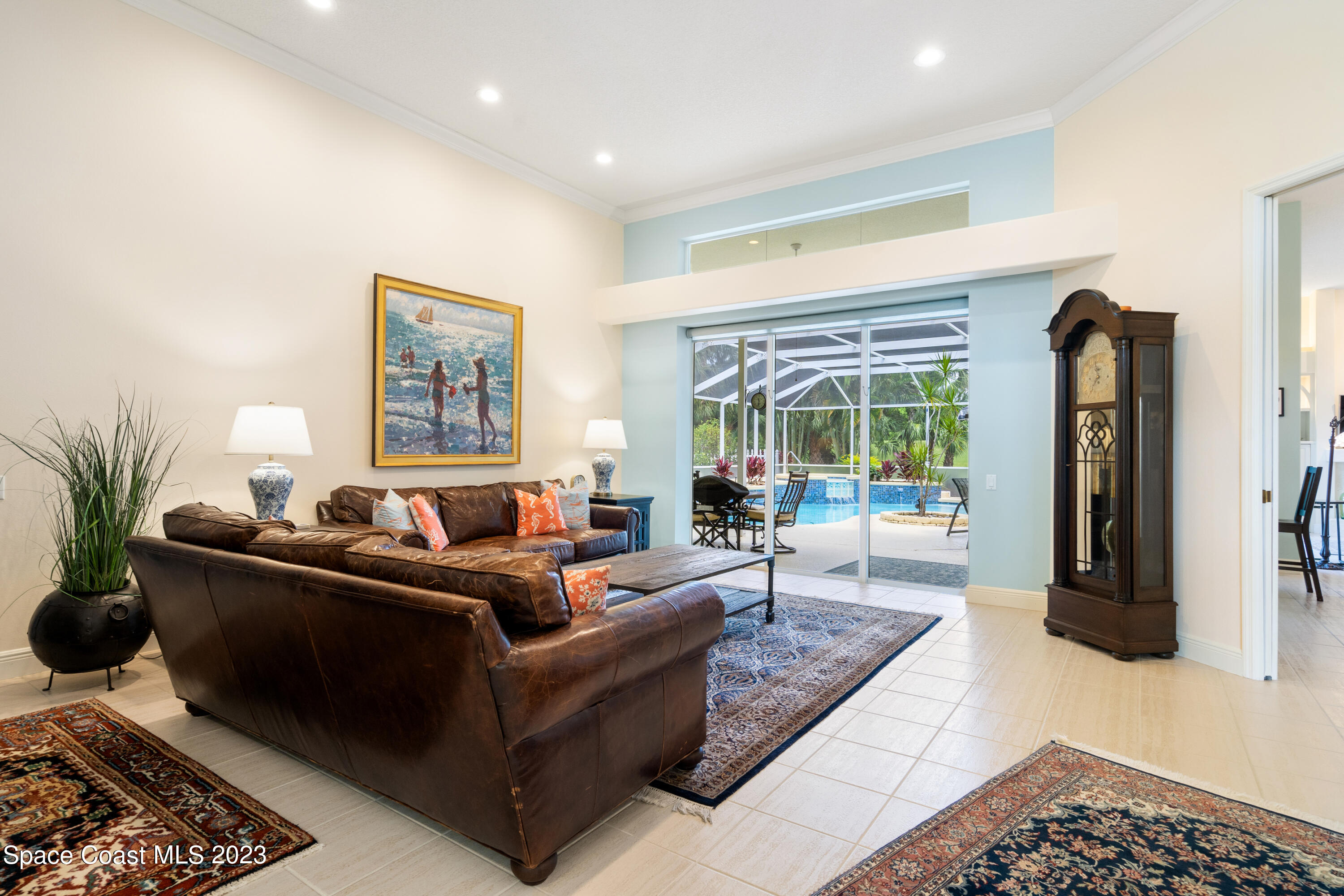 Undisclosed Address Vero Beach, FL 32967 - Photo 12 of 36 a living room with furniture rug and a large window