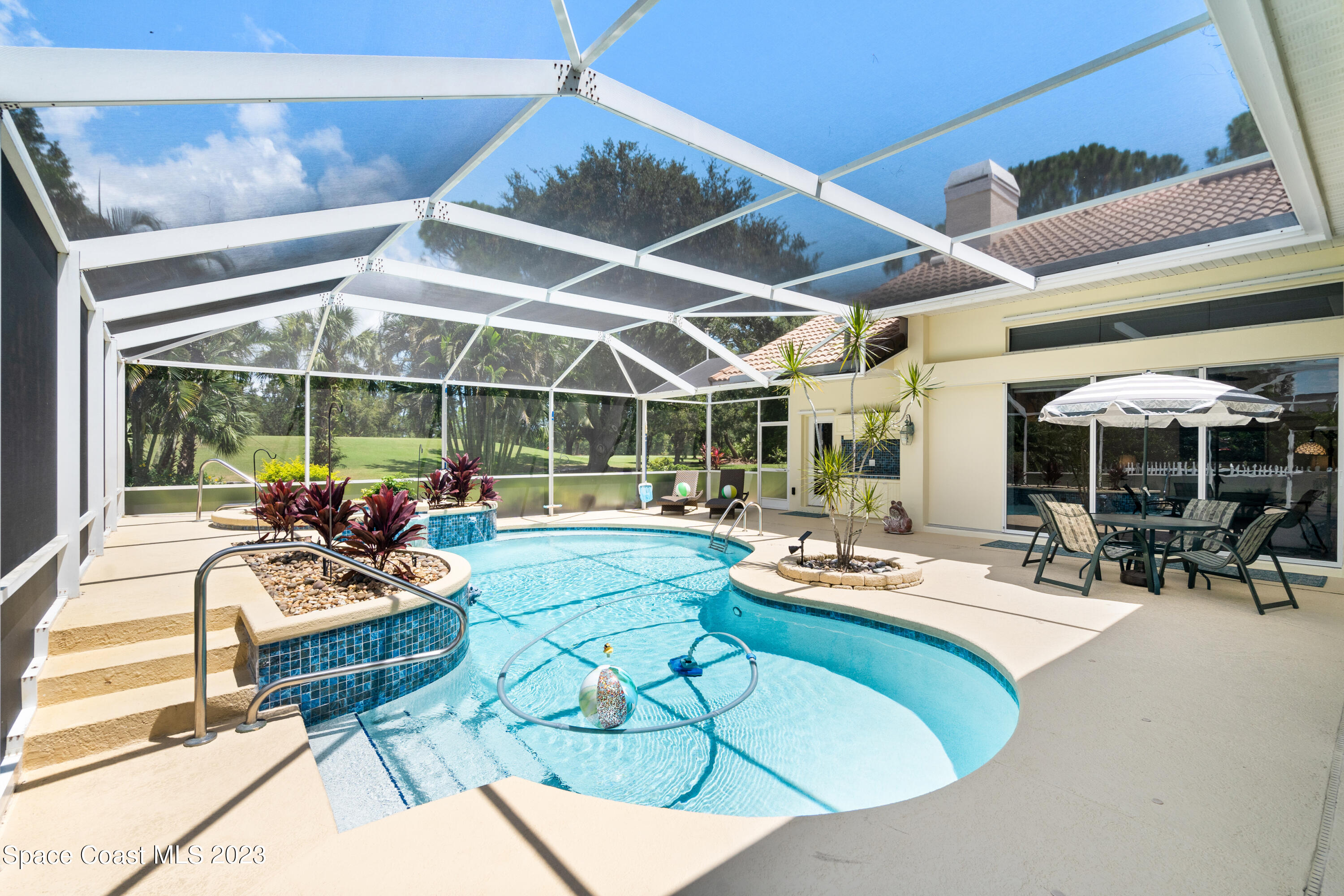 Undisclosed Address Vero Beach, FL 32967 - Photo 14 of 36 a outdoor living space with patio furniture and garden view