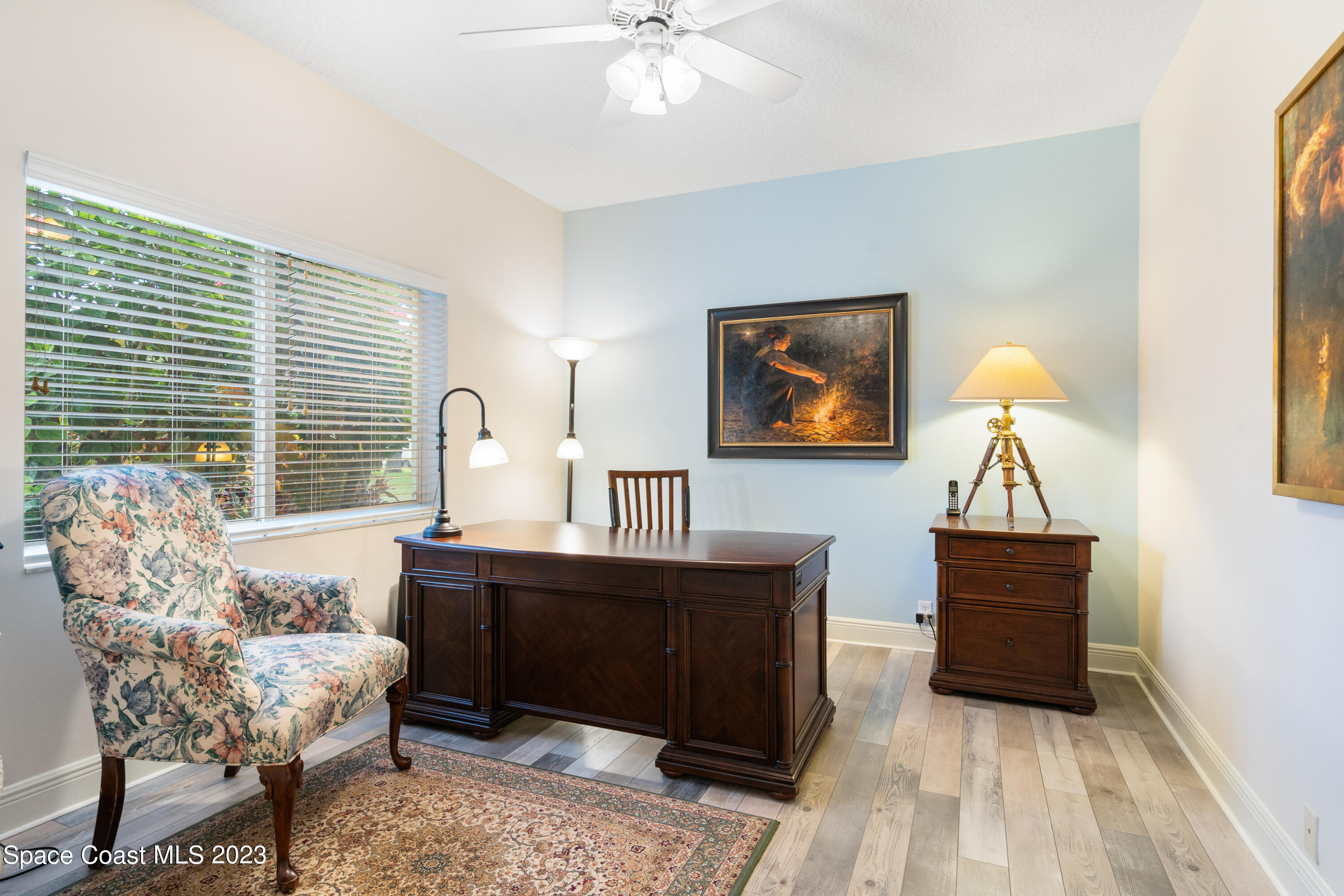 Undisclosed Address Vero Beach, FL 32967 - Photo 17 of 36 a living room with furniture and a window