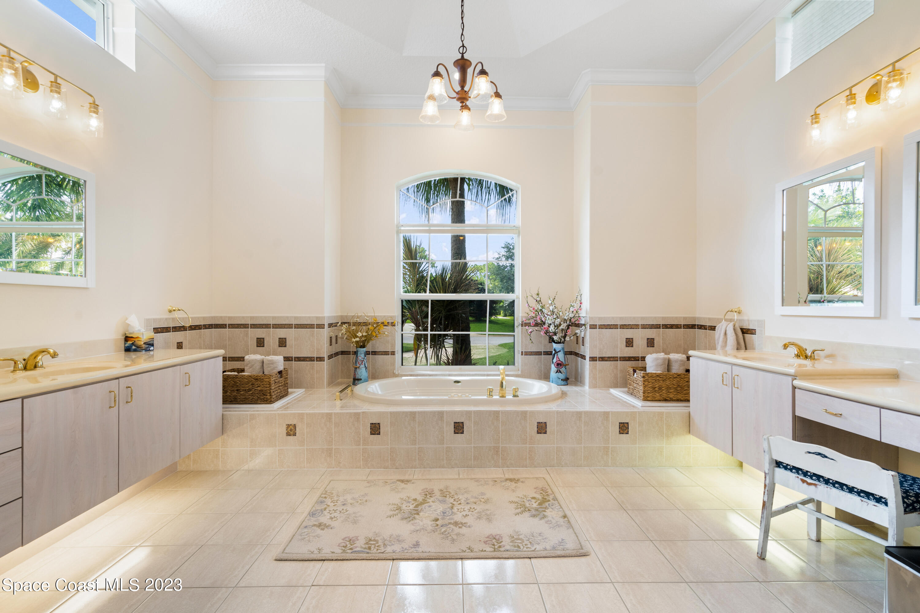 Undisclosed Address Vero Beach, FL 32967 - Photo 21 of 36 a large white kitchen with a large window