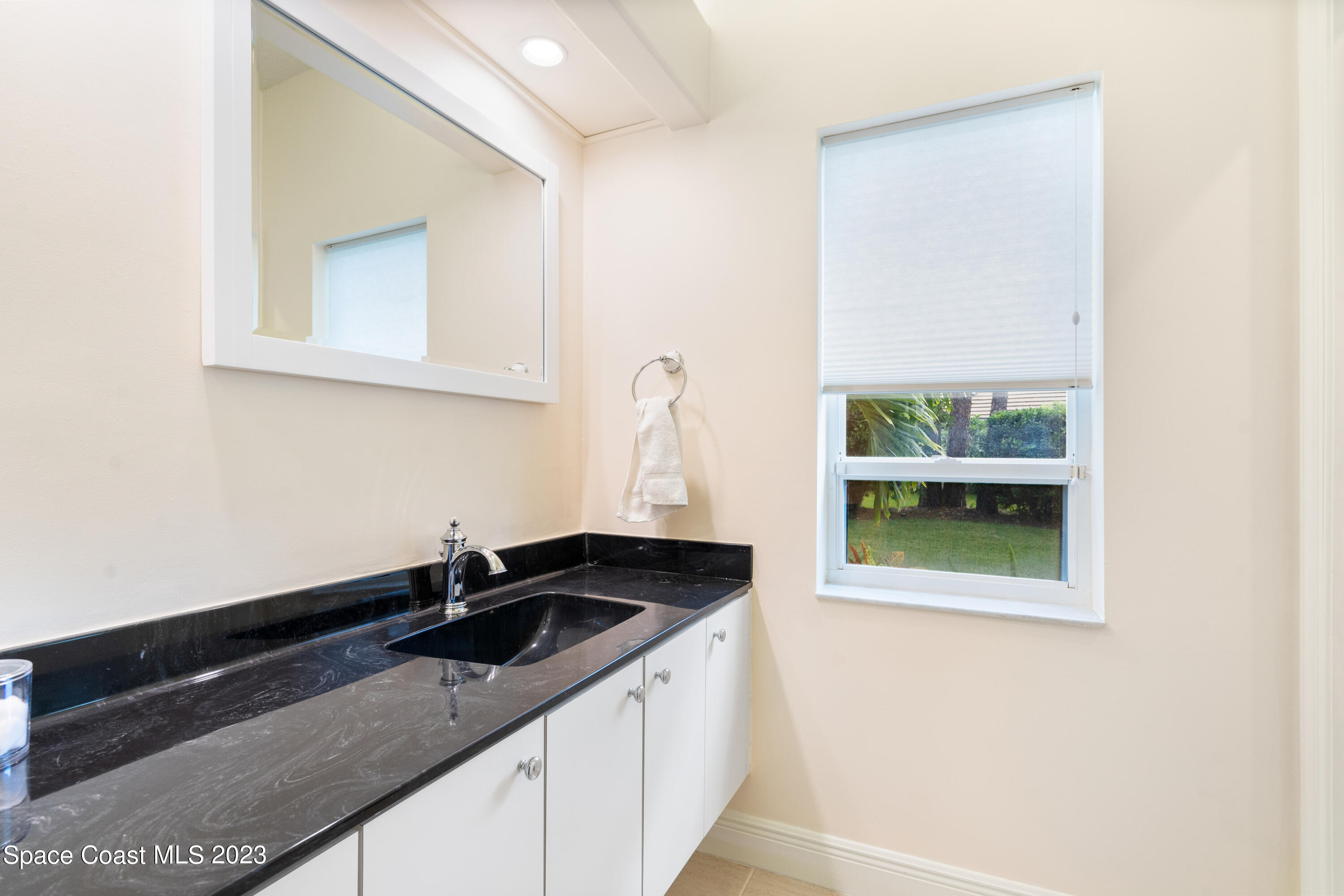 Undisclosed Address Vero Beach, FL 32967 - Photo 26 of 36 a kitchen with a sink and a window