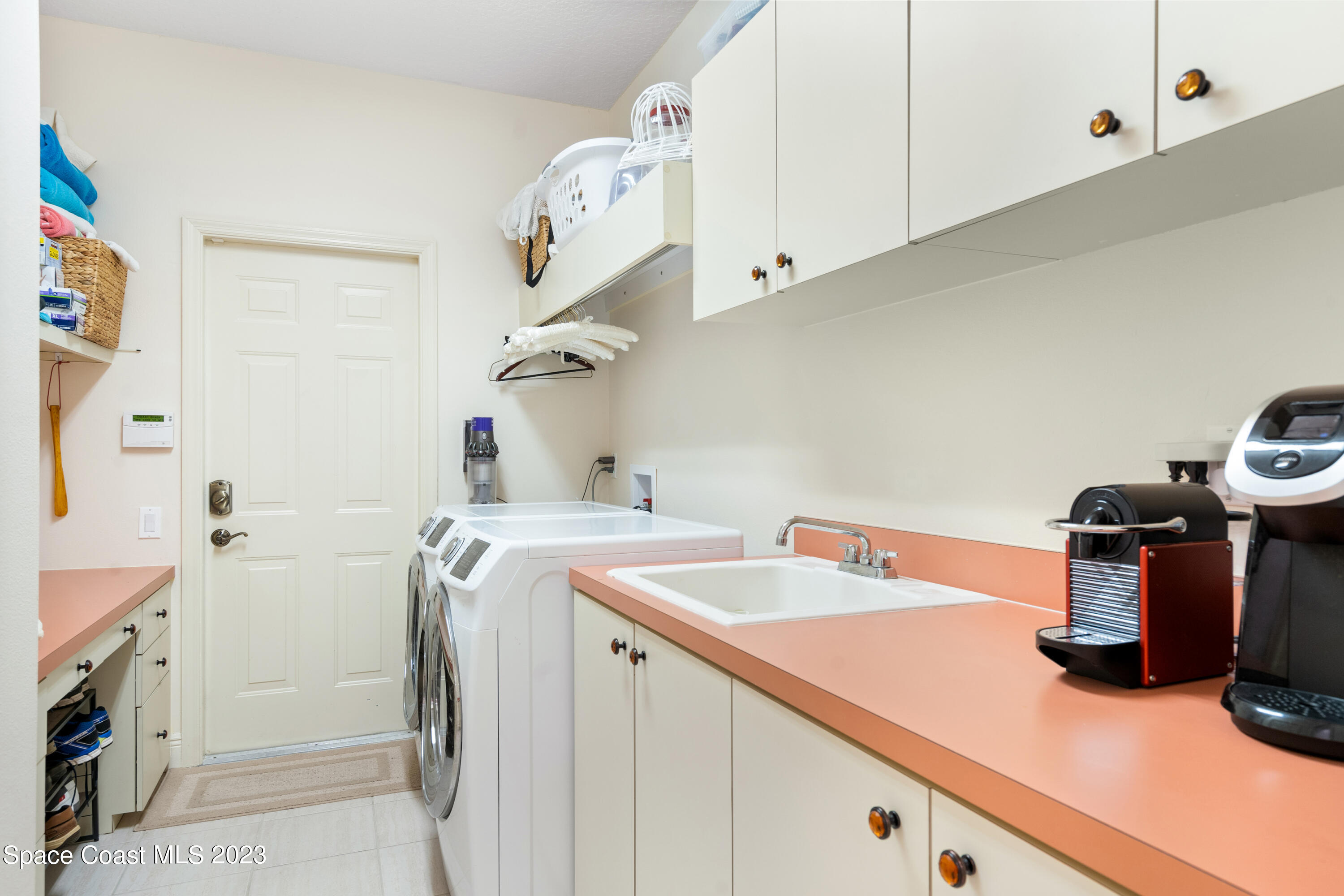 Undisclosed Address Vero Beach, FL 32967 - Photo 27 of 36 a utility room with dryer and washer