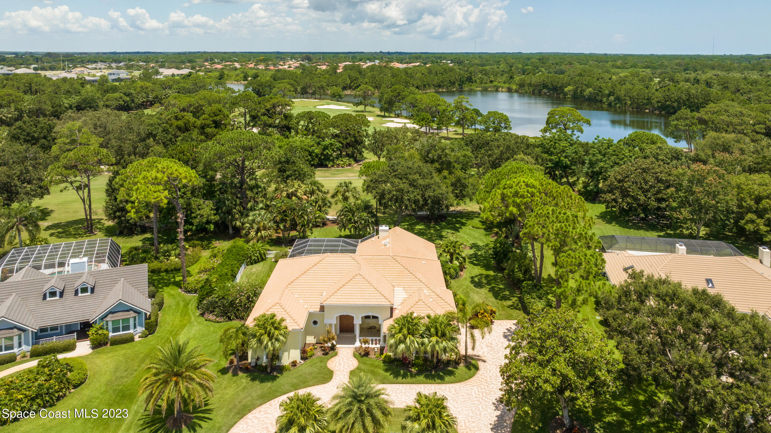 Undisclosed Address Vero Beach, FL 32967 - Photo 28 of 36 an aerial view of residential house with outdoor space and swimming pool
