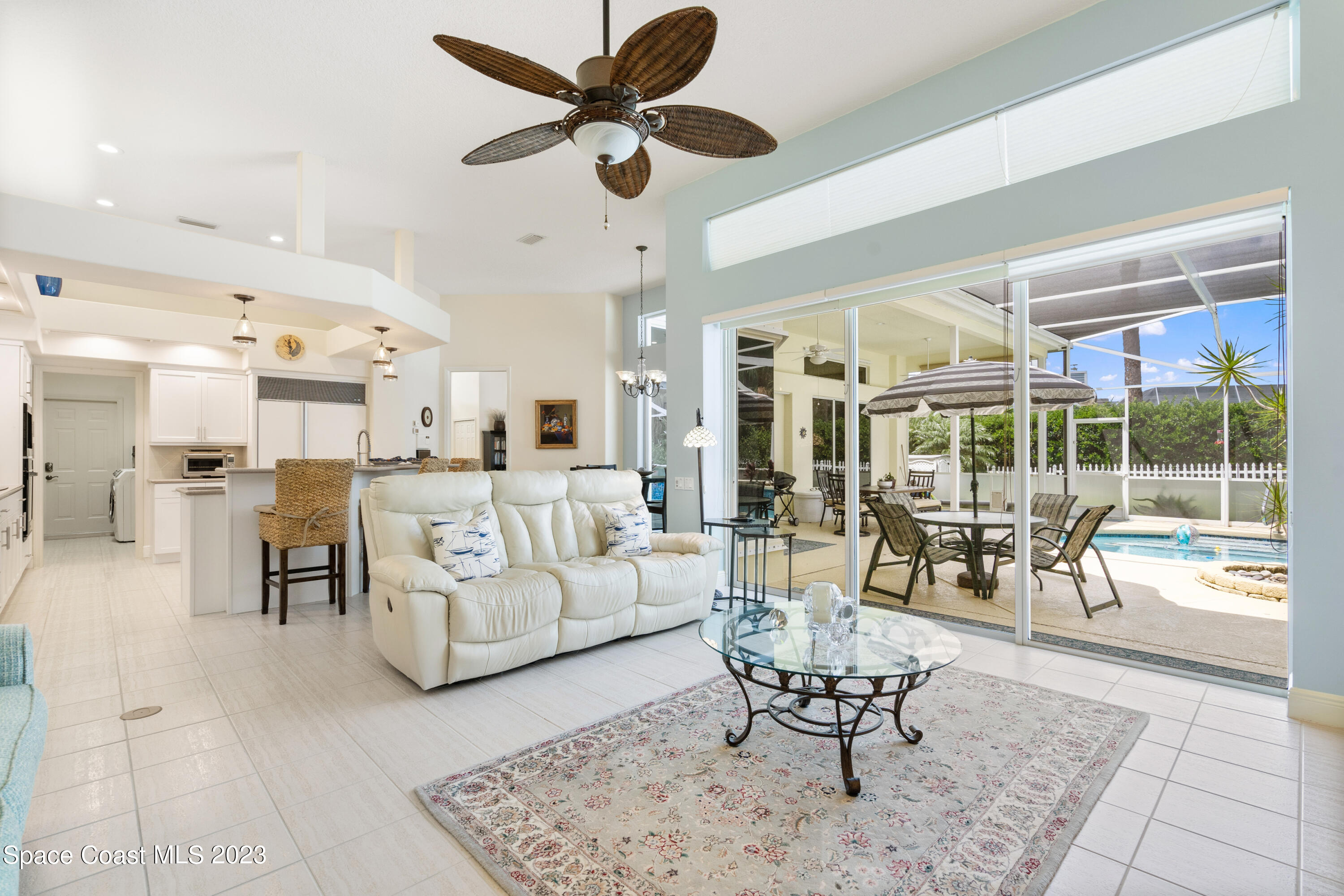 Undisclosed Address Vero Beach, FL 32967 - Photo 4 of 36 a living room with furniture and a large window