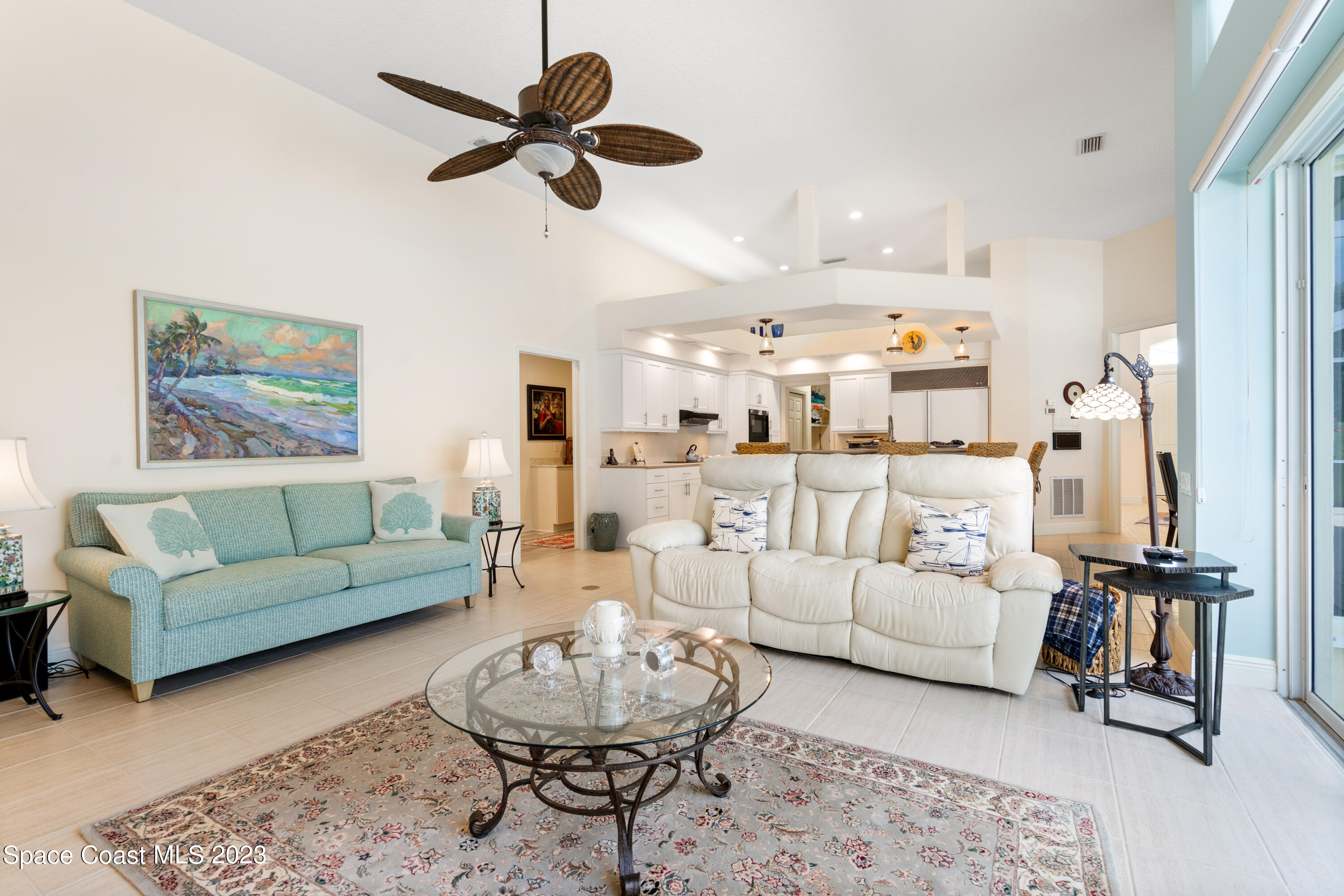 Undisclosed Address Vero Beach, FL 32967 - Photo 5 of 36 a living room with furniture ceiling fan and a rug