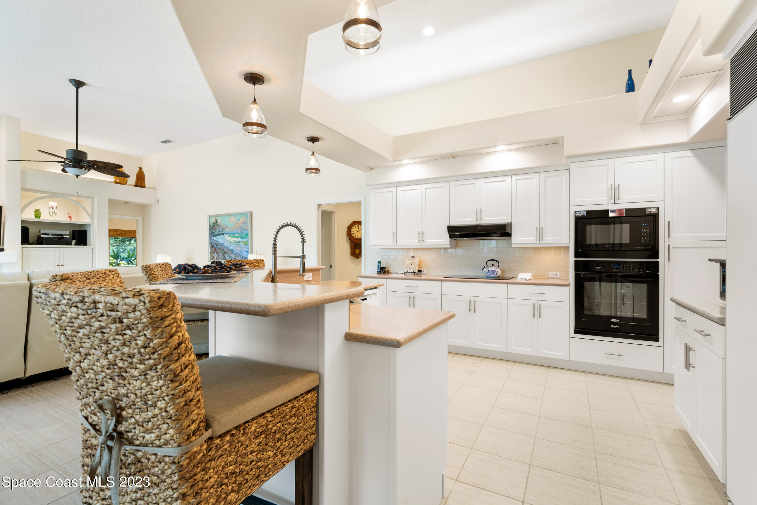 Undisclosed Address Vero Beach, FL 32967 - Photo 9 of 36 a kitchen with granite countertop a sink stainless steel appliances and cabinets