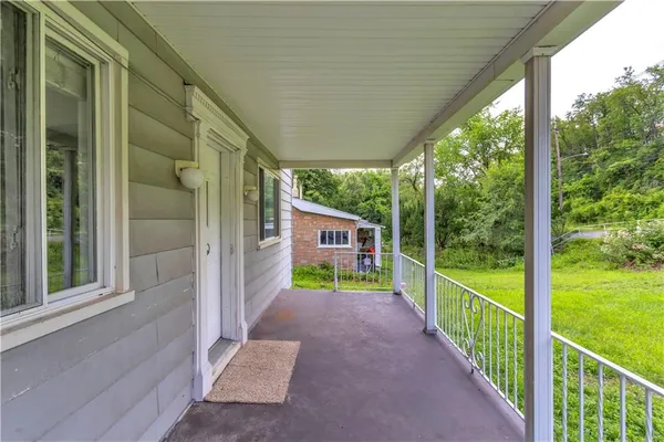 a view of a house with a porch