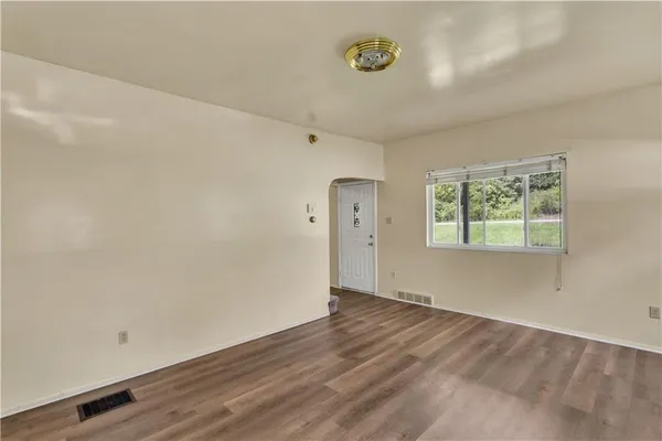 an empty room with a window