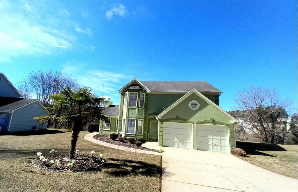 2723 Da Vinci Crescent Decatur, GA 30034 - Photo 1 of 1 a front view of a house with a yard