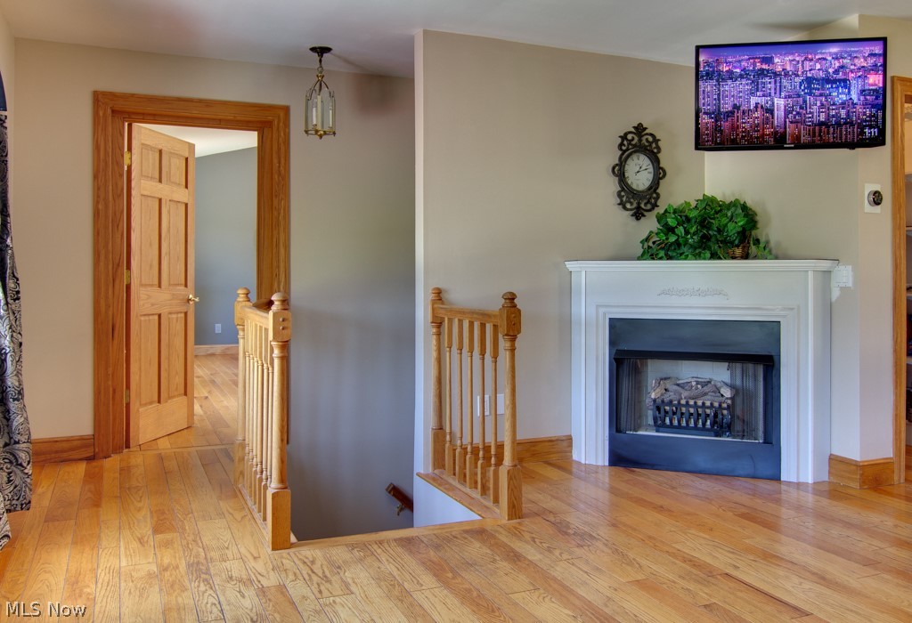 17460 Snyder Road Chagrin Falls, OH 44023 - Photo 11 of 32 The upstairs great room offers a gas fireplace and opens up into a huge loft.