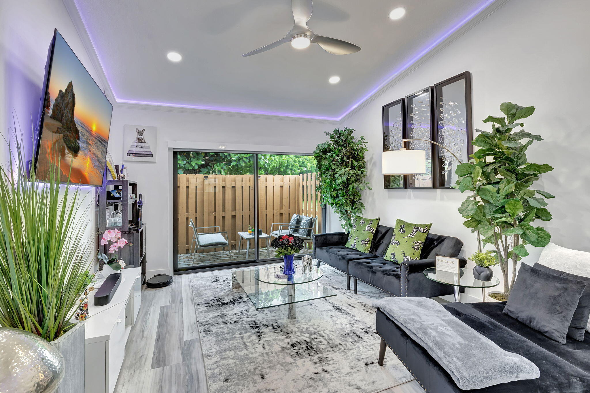 2320 Northwest 37th Avenue, Unit D29 Coconut Creek, FL 33066 - Photo 12 of 27 a living room with furniture and a potted plant