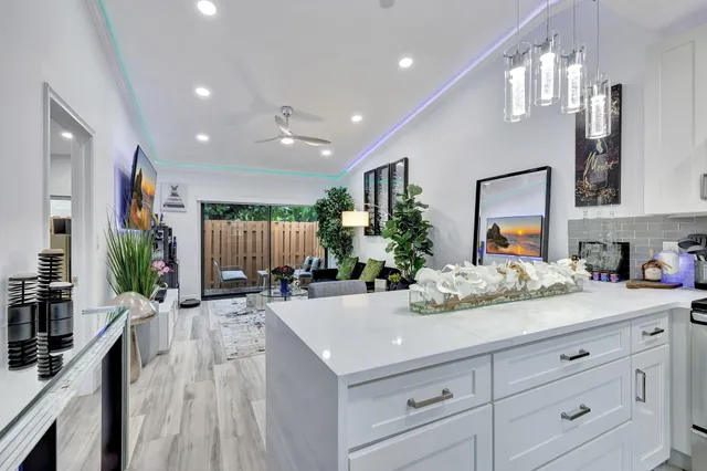 an aerial view of a house with a swimming pool