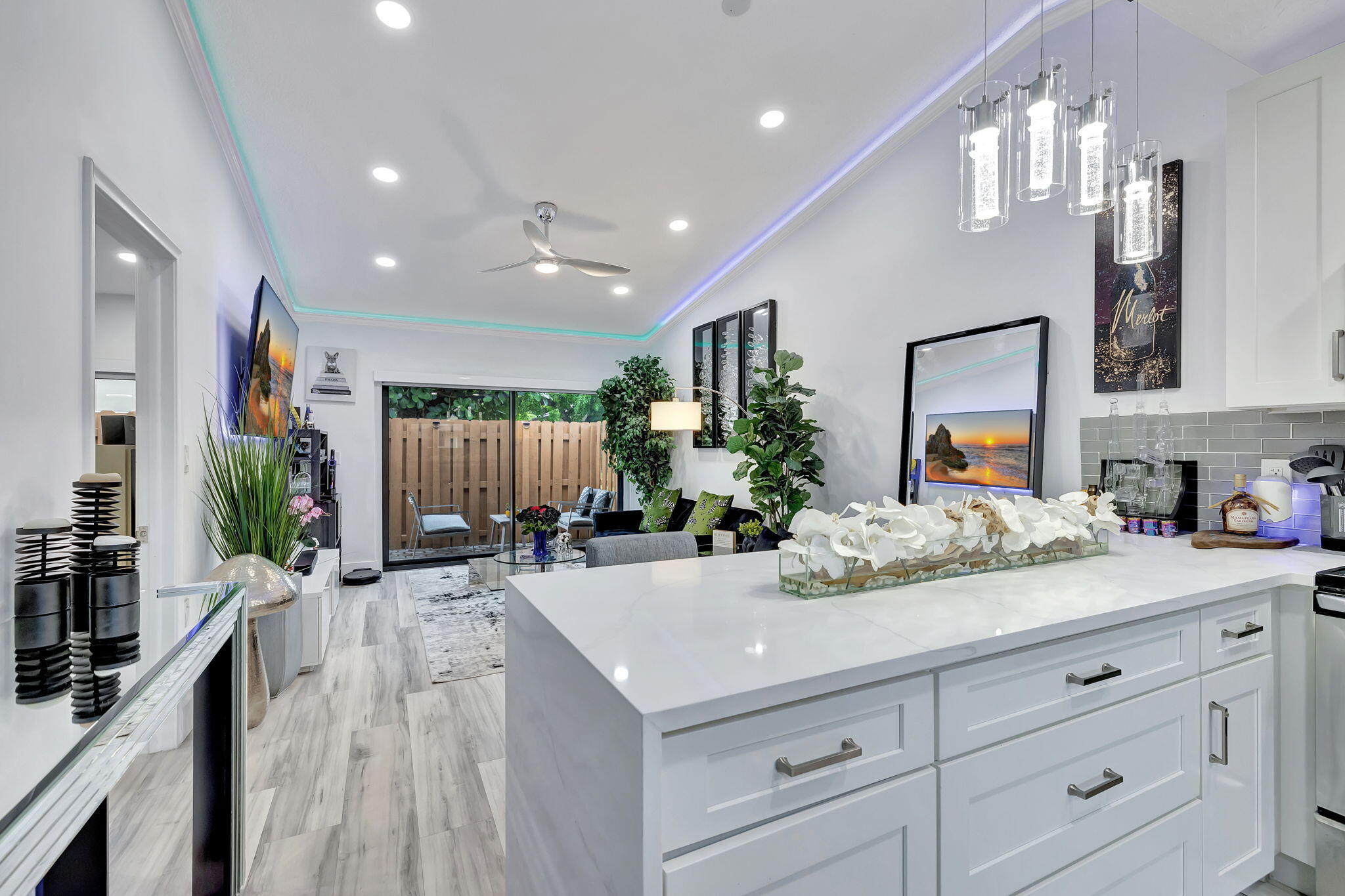 2320 Northwest 37th Avenue, Unit D29 Coconut Creek, FL 33066 - Photo 24 of 27 a living room with furniture and potted plant