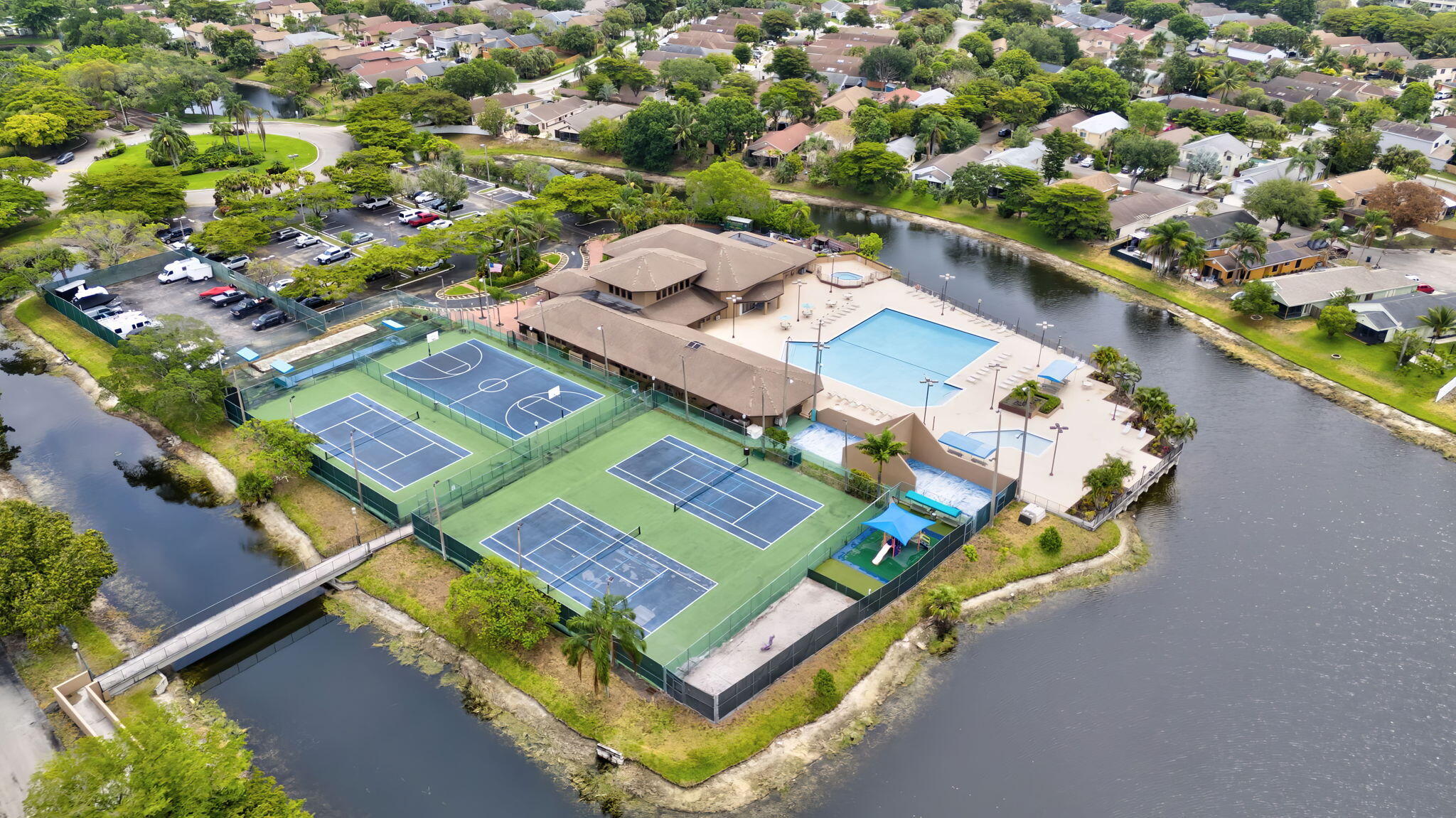 2320 Northwest 37th Avenue, Unit D29 Coconut Creek, FL 33066 - Photo 25 of 27 an aerial view of a residential houses with yard