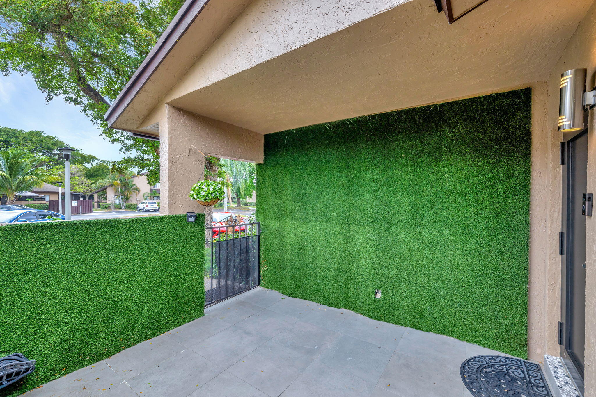 2320 Northwest 37th Avenue, Unit D29 Coconut Creek, FL 33066 - Photo 6 of 27 a backyard of a house with lots of green space