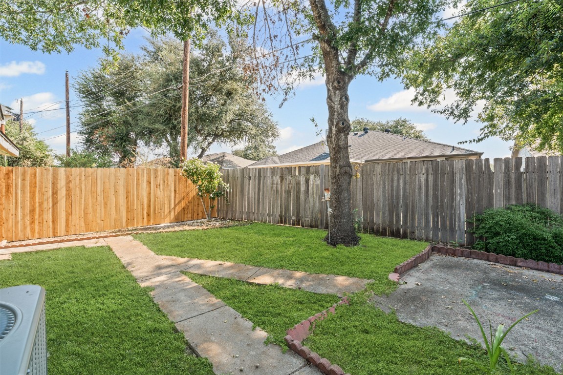 4707 Ridge Way Drive Temple, TX 76502 - Photo 23 of 29 a view of a yard with wooden fence