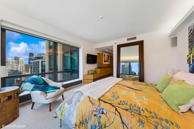 a view of city with tall buildings