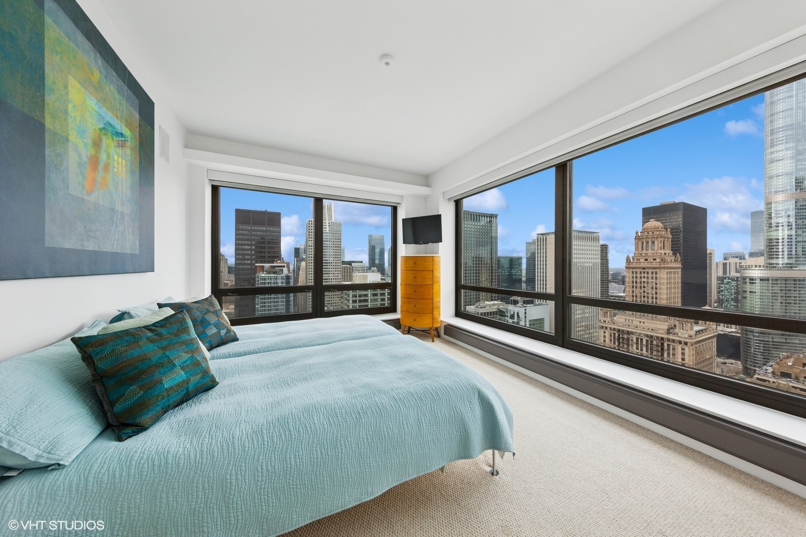 130 North Garland Court, Unit 4101 Chicago, IL 60602 - Photo 23 of 49 a bedroom with a large bed and a large window