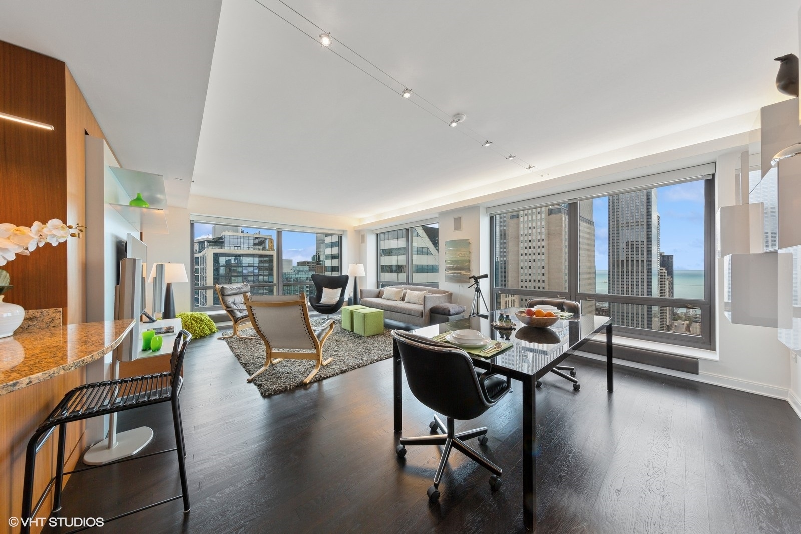 130 North Garland Court, Unit 4101 Chicago, IL 60602 - Photo 4 of 49 a living room with furniture and floor to ceiling windows