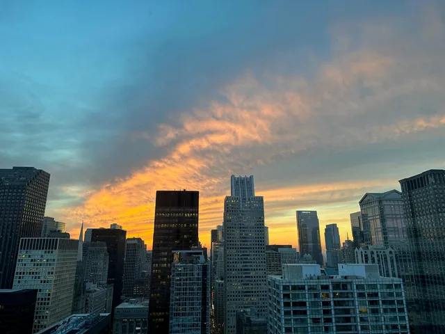 a view of a city with tall buildings
