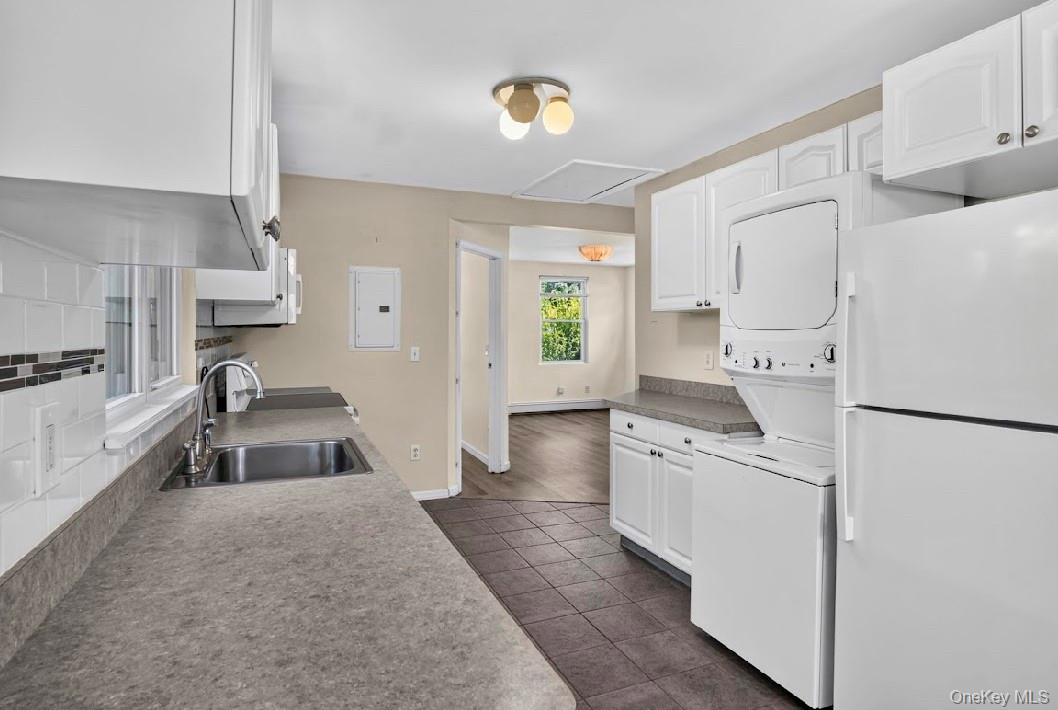 62 Shell Road Rocky Point, NY 11778 - Photo 7 of 22 Kitchen featuring stackable W/D.