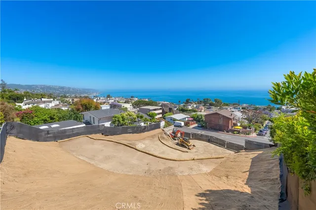 a view of a road with a ocean view