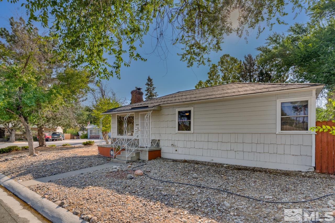 1699 Watt Street Reno, NV 89509 - Photo 1 of 18 a view of a house with a backyard