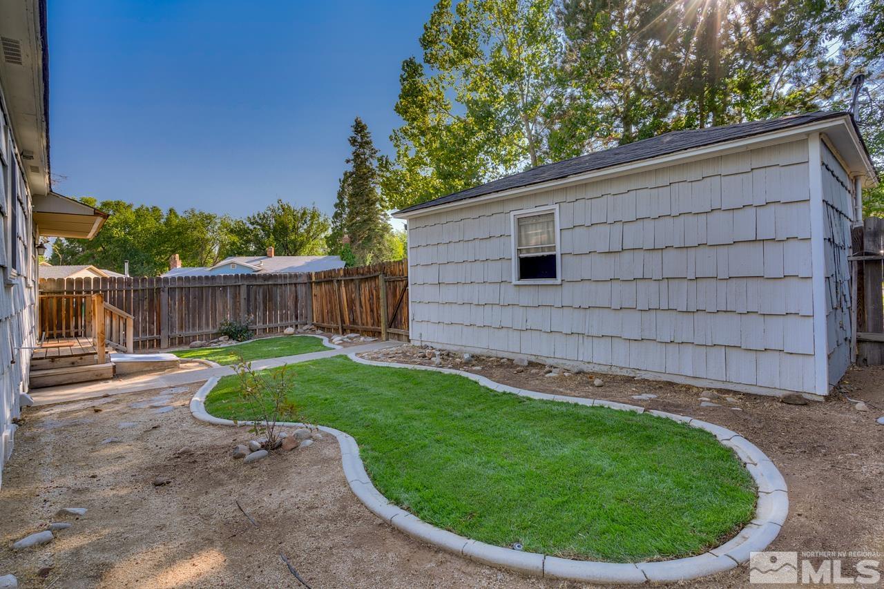 1699 Watt Street Reno, NV 89509 - Photo 18 of 18 a view of a backyard with a small cabin