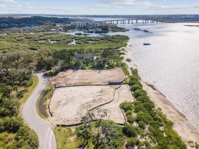 a view of a swimming pool with a yard