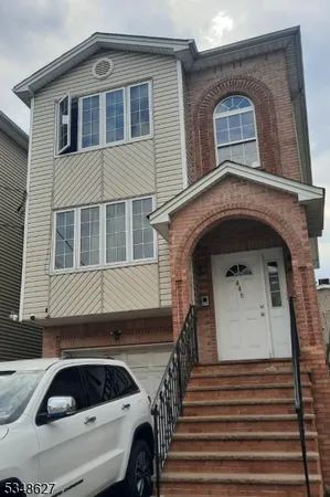 a front view of a house with a door
