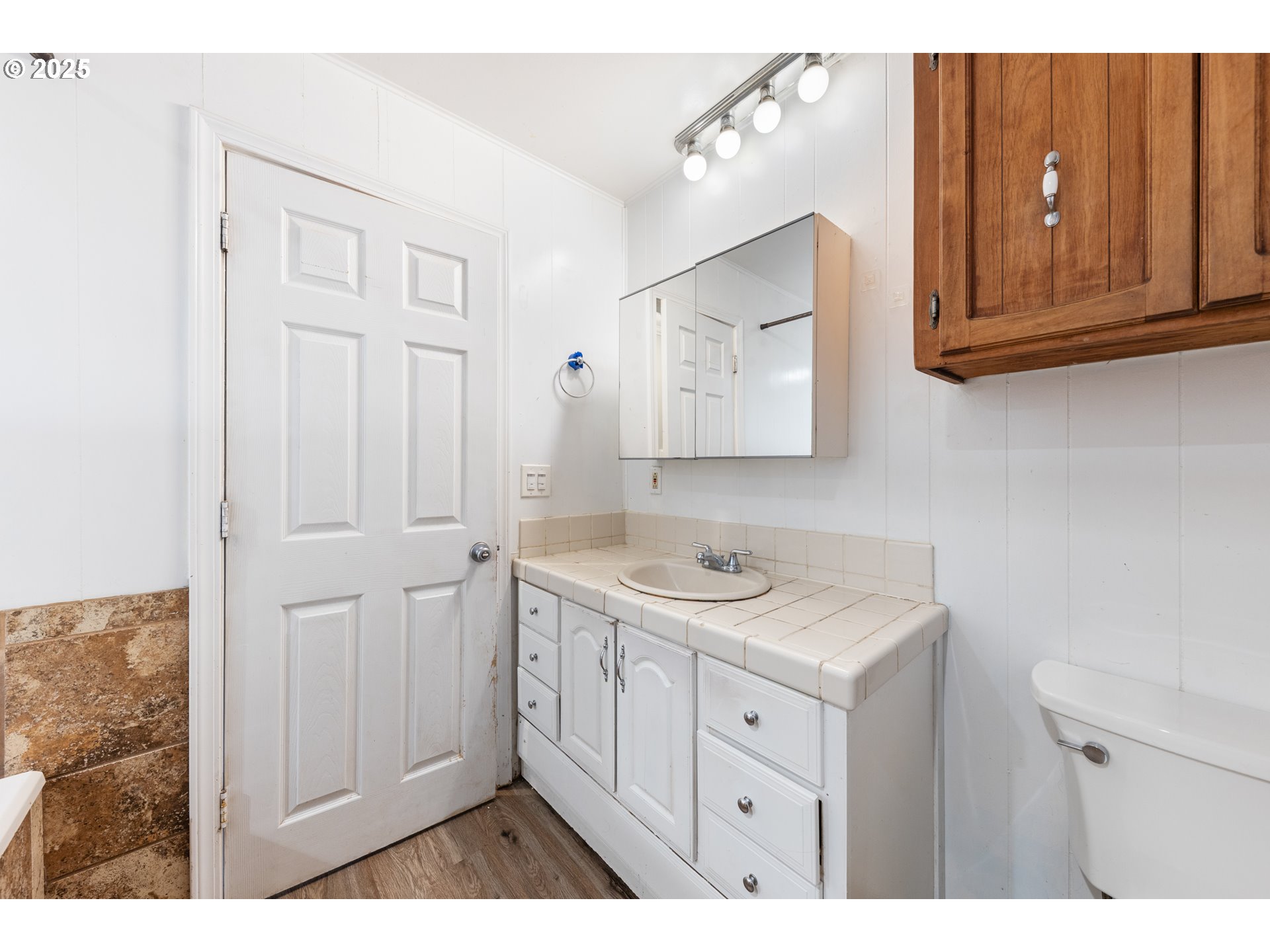 31778 Highway 213 Molalla, OR 97038 - Photo 22 of 47 a bathroom with a sink a vanity and mirror