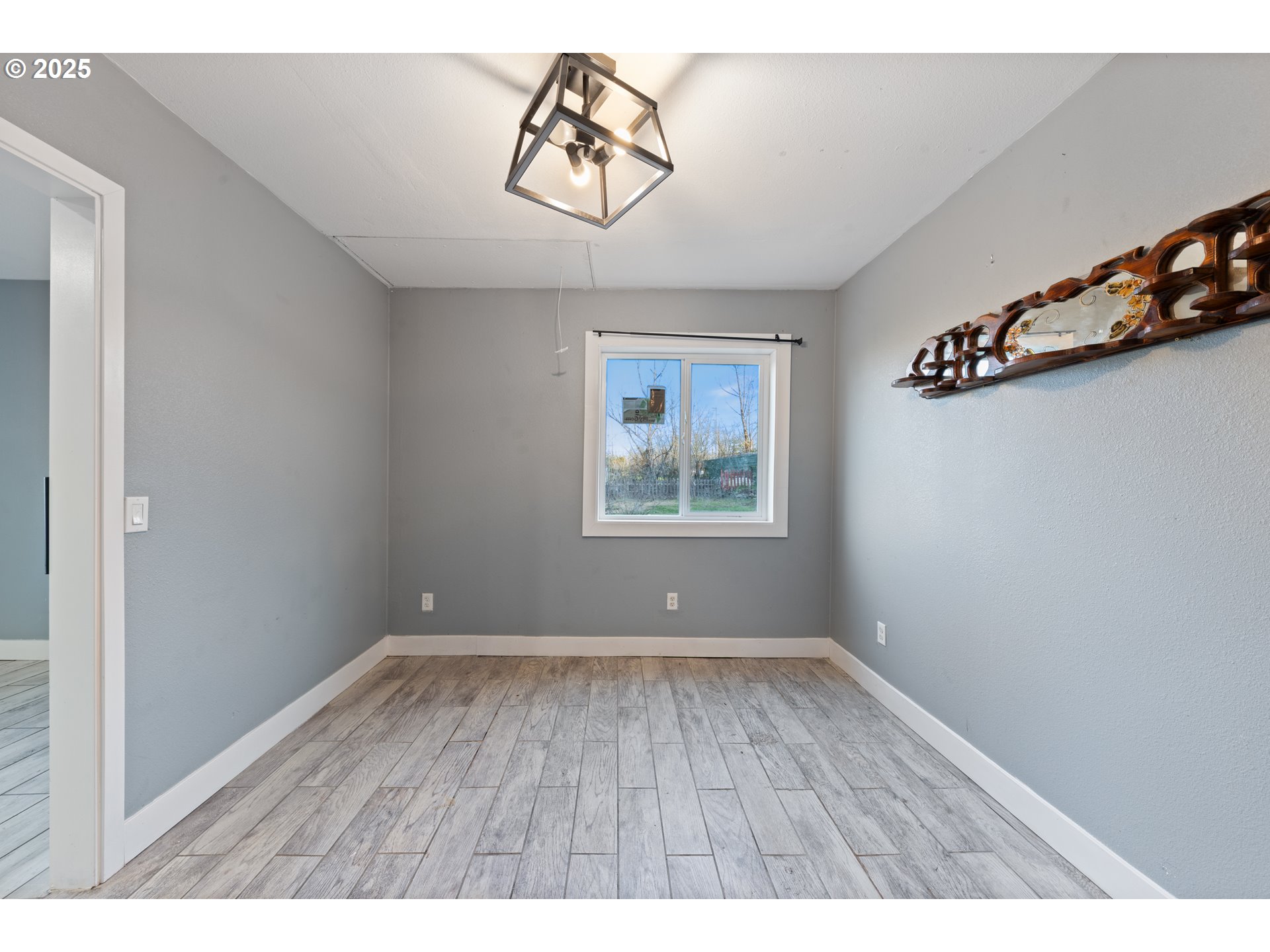 31778 Highway 213 Molalla, OR 97038 - Photo 35 of 47 a view of room with hardwood floor and window