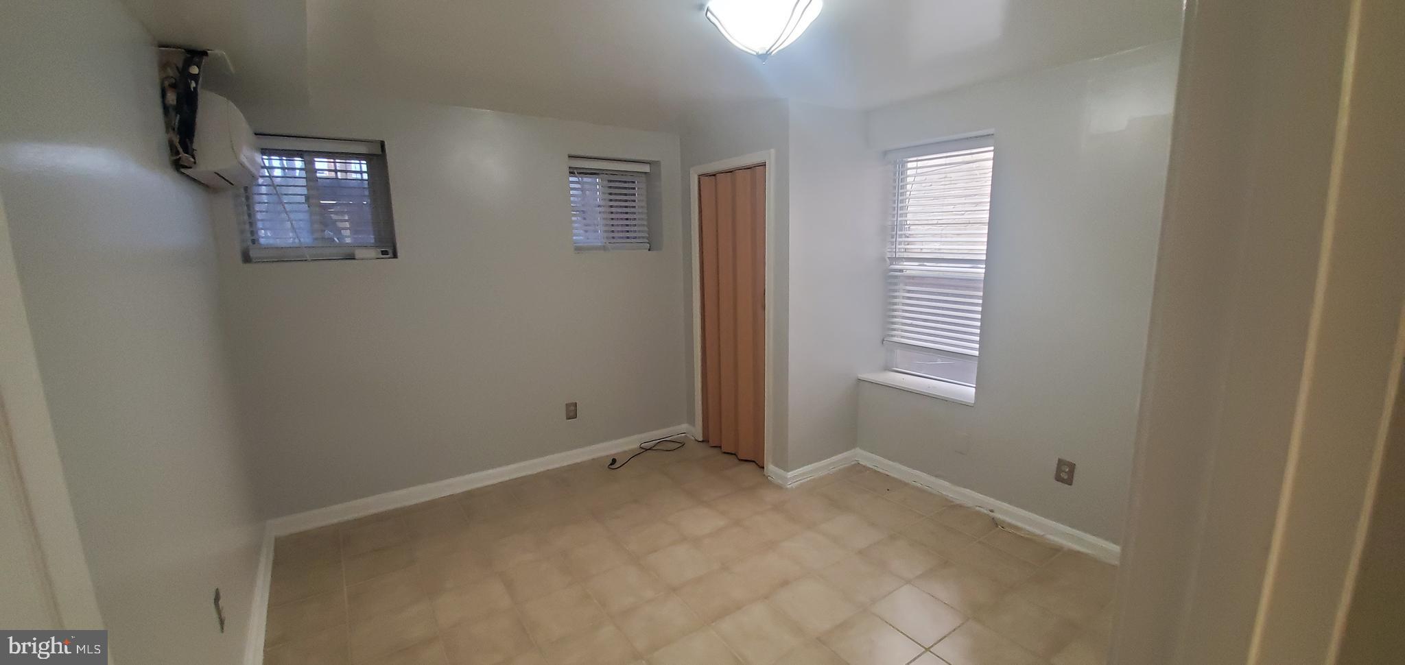 17 Quincy Place Northwest, Unit B Washington, DC 20001 - Photo 18 of 22 a view of an empty room with a window